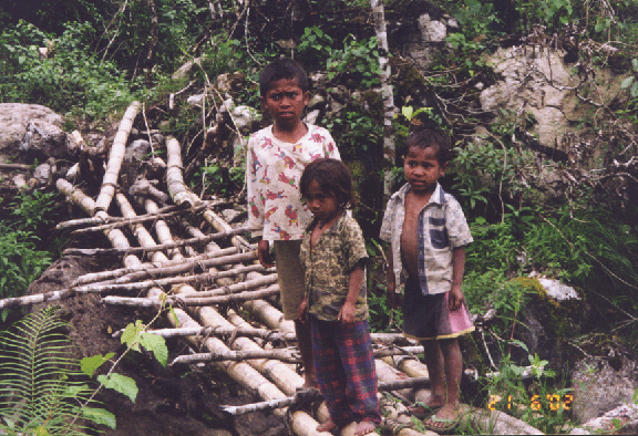 6 our young guides on bamboo bridge