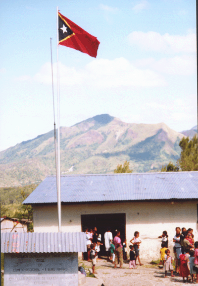 18 Timorese flag outside mobile clinic in Soro near Ainaro