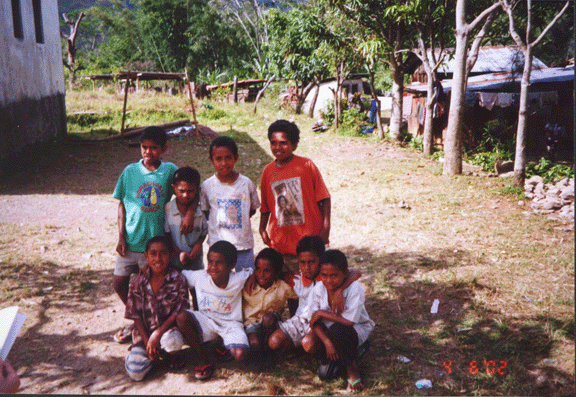 9 Ainaro school kids next to preseminary 