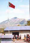 18 flag outside mobile clinic in Soro